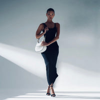 Vendaya – White Curved Handbag